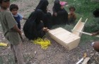 Training of producing groups members on making improved wooden beehives 